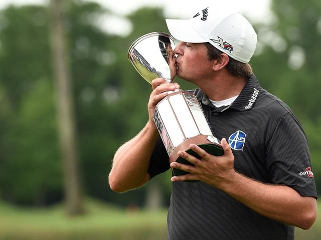 Brian Stuard with the Zurich Classic trophy